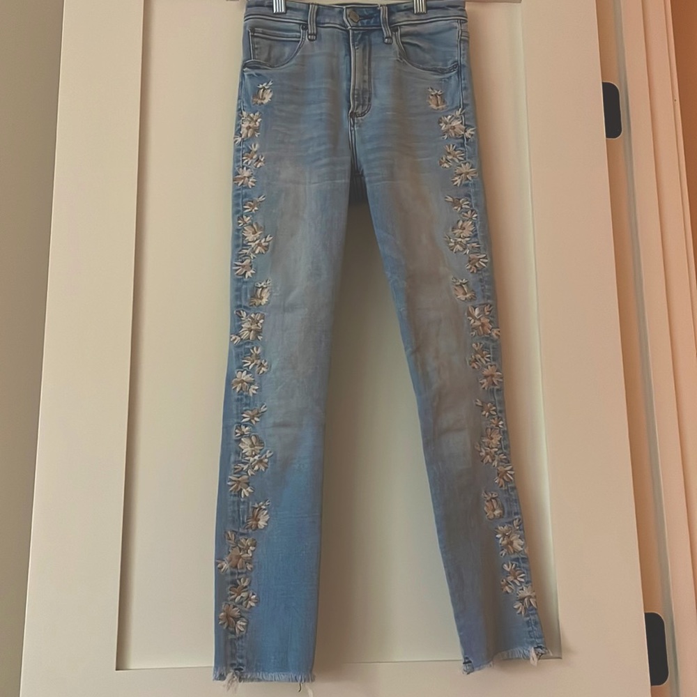 Abercrombie light wash jeans with flower embroidery down side